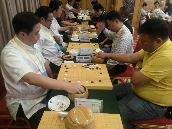 2013年泰恩康-炎黄杯世界华人名流赛在汕头举行，郑汉杰与王国东在比赛中碰头